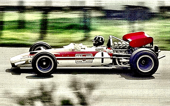 Tripple Crown Champion Auto Racer Graham Hill in a Lotus 49