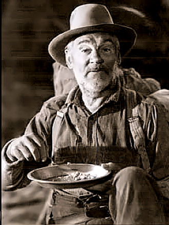 Walter Huston as Howard