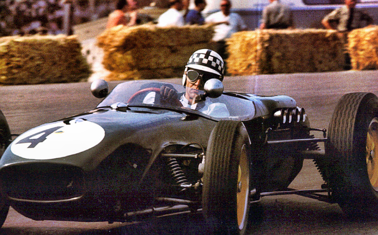 Driver Innes Ireland in a Lotus-18