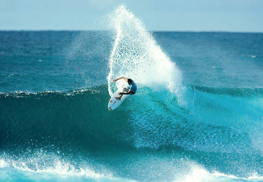 Champion Surfer Andy Irons at work