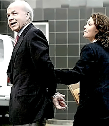 Enron CEO Kenneth Lay doing perp walk