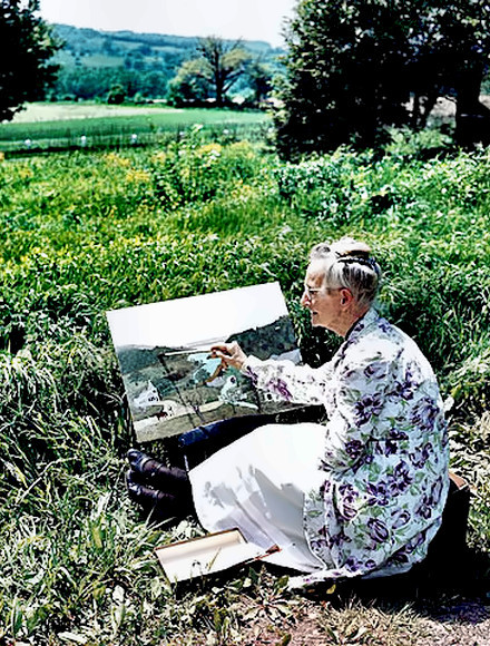 Painter Grandma Moses at work in the field