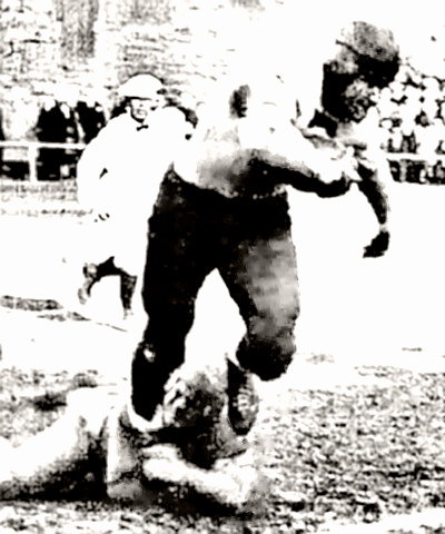 Bronko Nagurski leaves a would-be tackler in pain