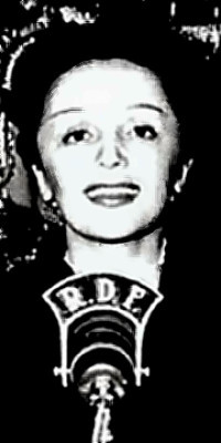 Edith Piaf at microphone