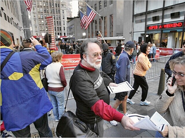 striker handing out leaflets